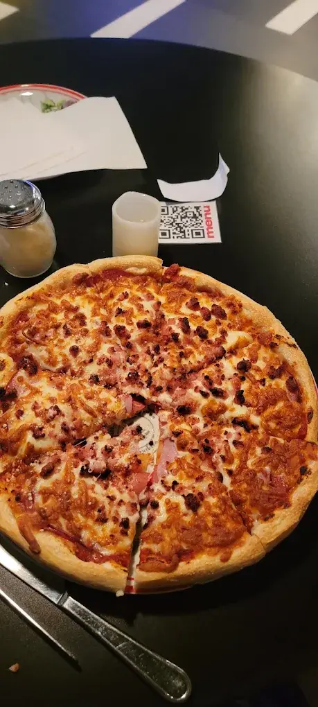 Delicious Pepperoni, Ham & Bacon Pizza at DJ's Pizzeria & Lounge in St Albert, AB